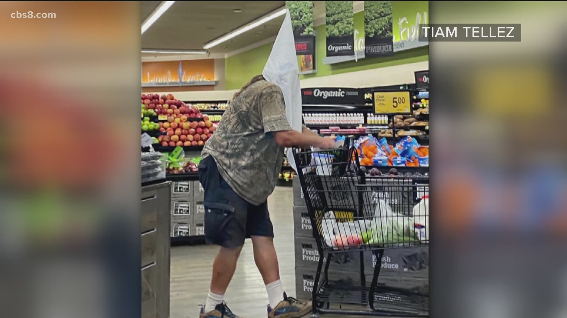 A disturbing post, showing a man wearing a KKK hood while grocery shopping at Vons, has been circulating on social media.