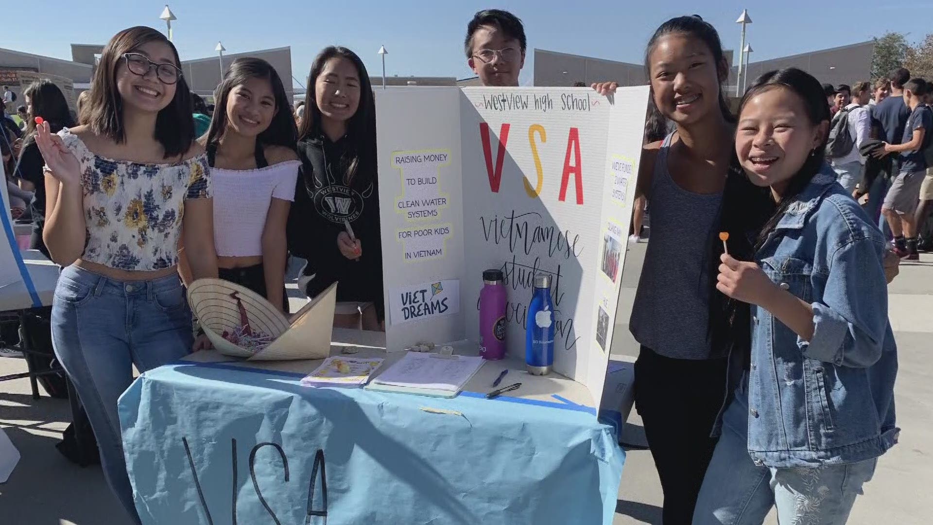 A group of girls from Westview High School's Vietnamese Student Association are sewing and selling scrunchies to fund water systems overseas.