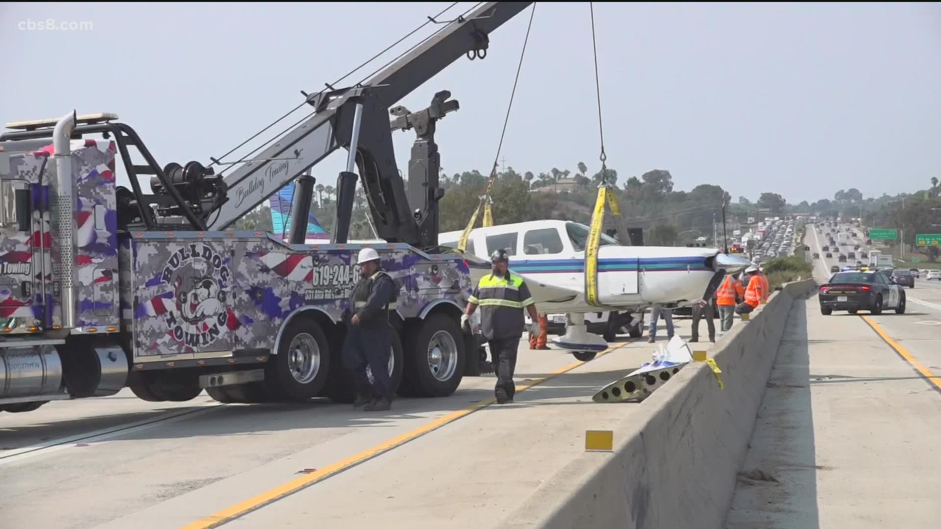 Newly released air traffic control radio calls recount the harrowing moments before the plane landed on the freeway.