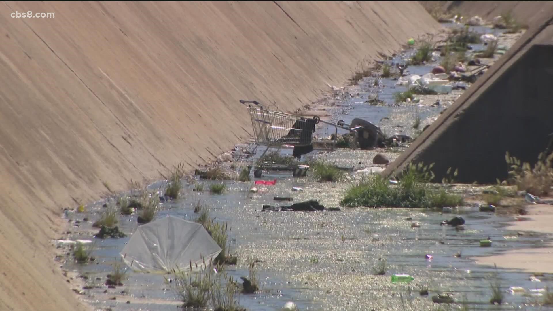 Homeless encampments fill storm drain in El Cajon with trash and debris