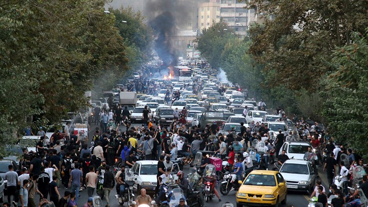 At least 9 killed as Iran protests over woman's death spread