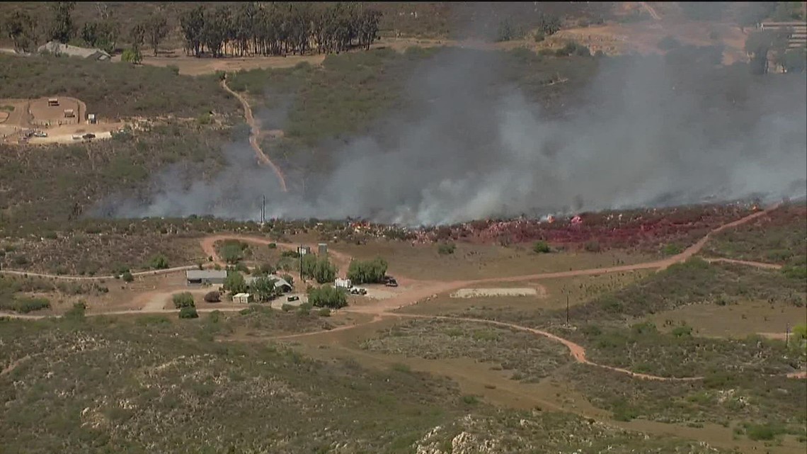 Fire crews extinguish brush fire in Poway, Highway 67 reopened