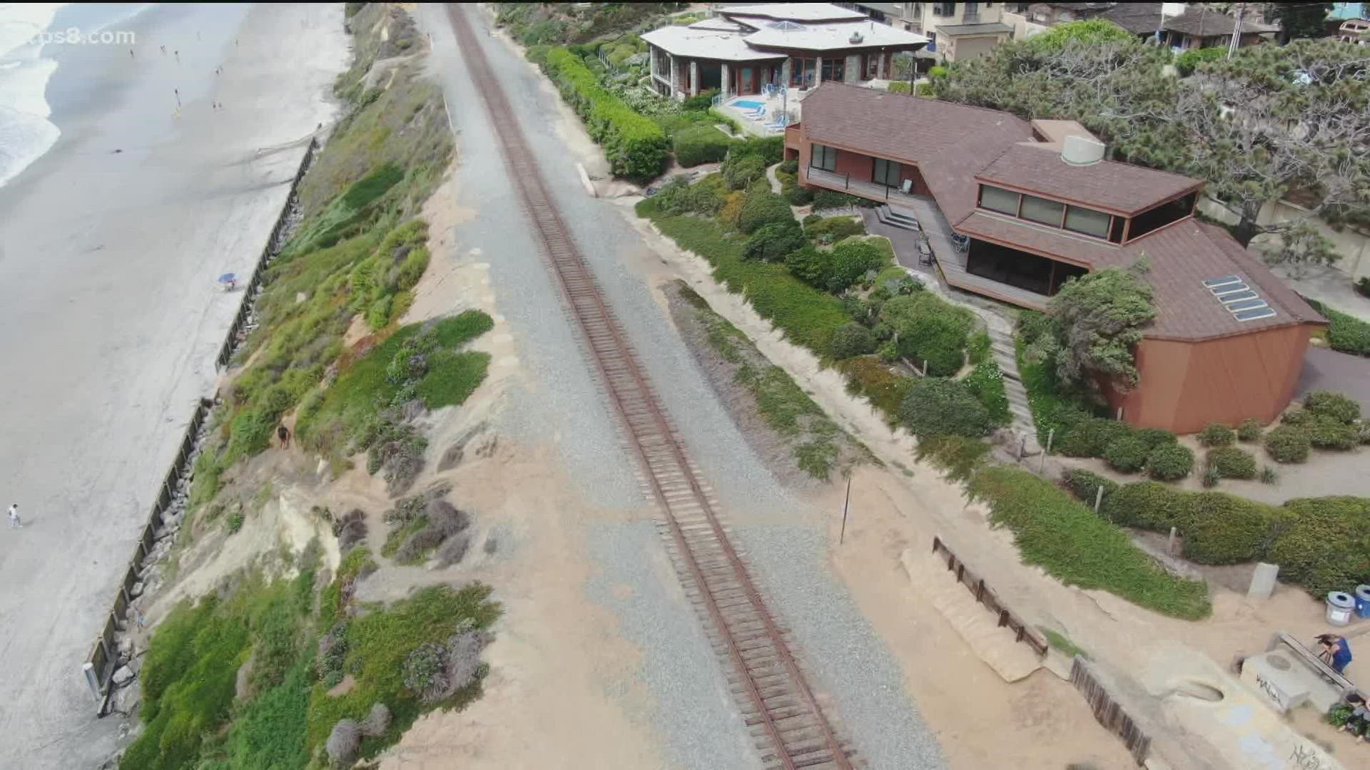Plans to build a fence along the Del Mar bluffs are moving forward, and some people are sounding off in opposition saying it will impact beach access.