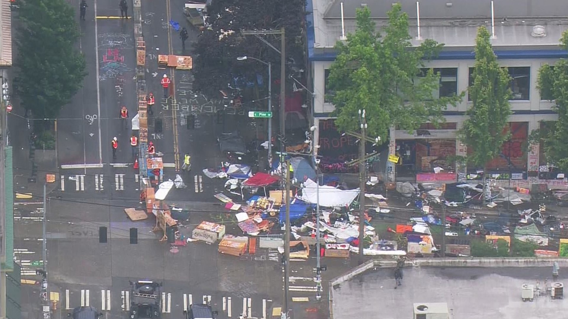 25 arrested during overnight protests after Seattle police dismantle ...