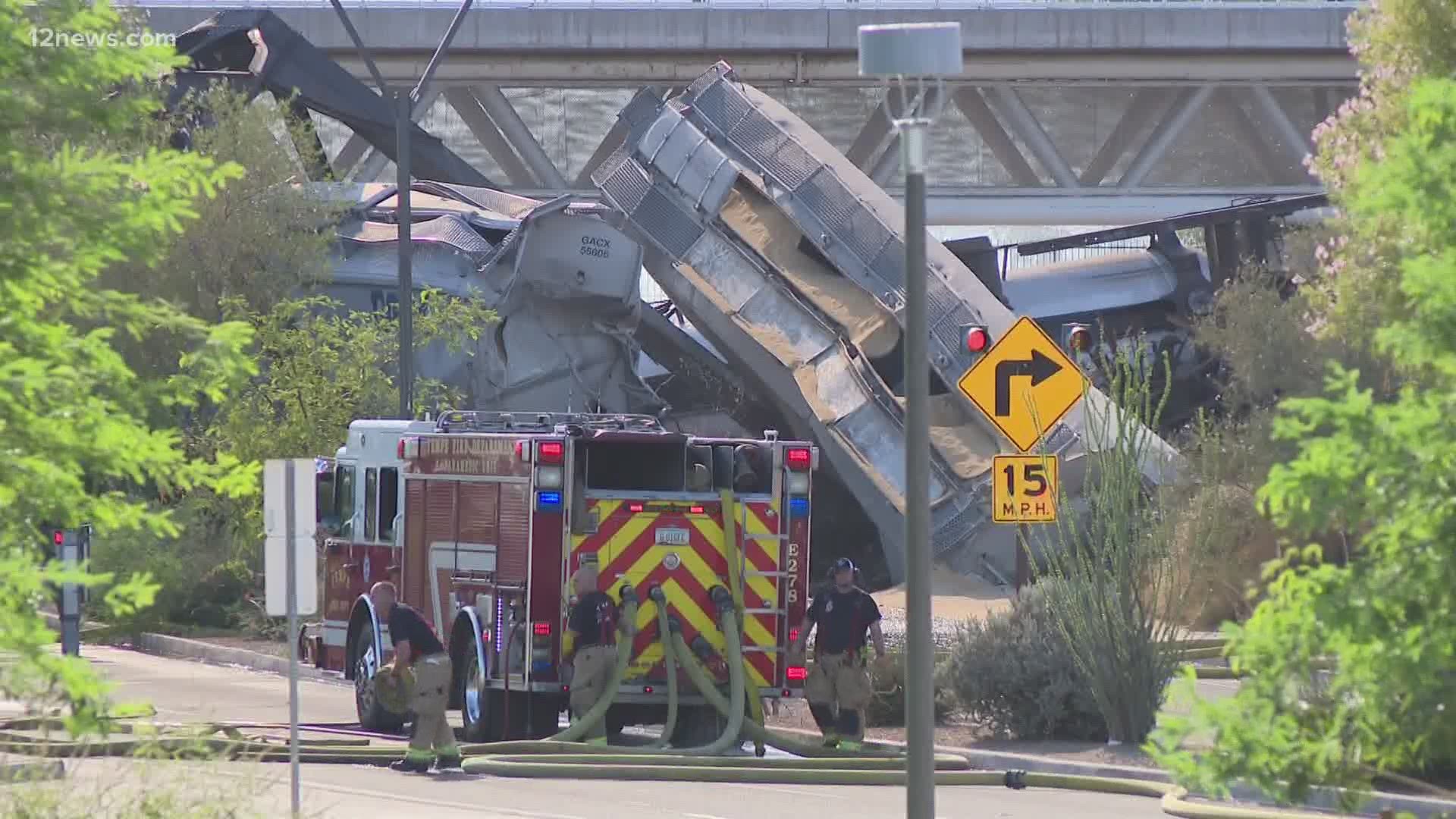 Fire crews were battling a massive fire involving a train on the Tempe Town Lake bridge early Wednesday. Heavy smoke was seen over Tempe Town Lake by Sky 12.