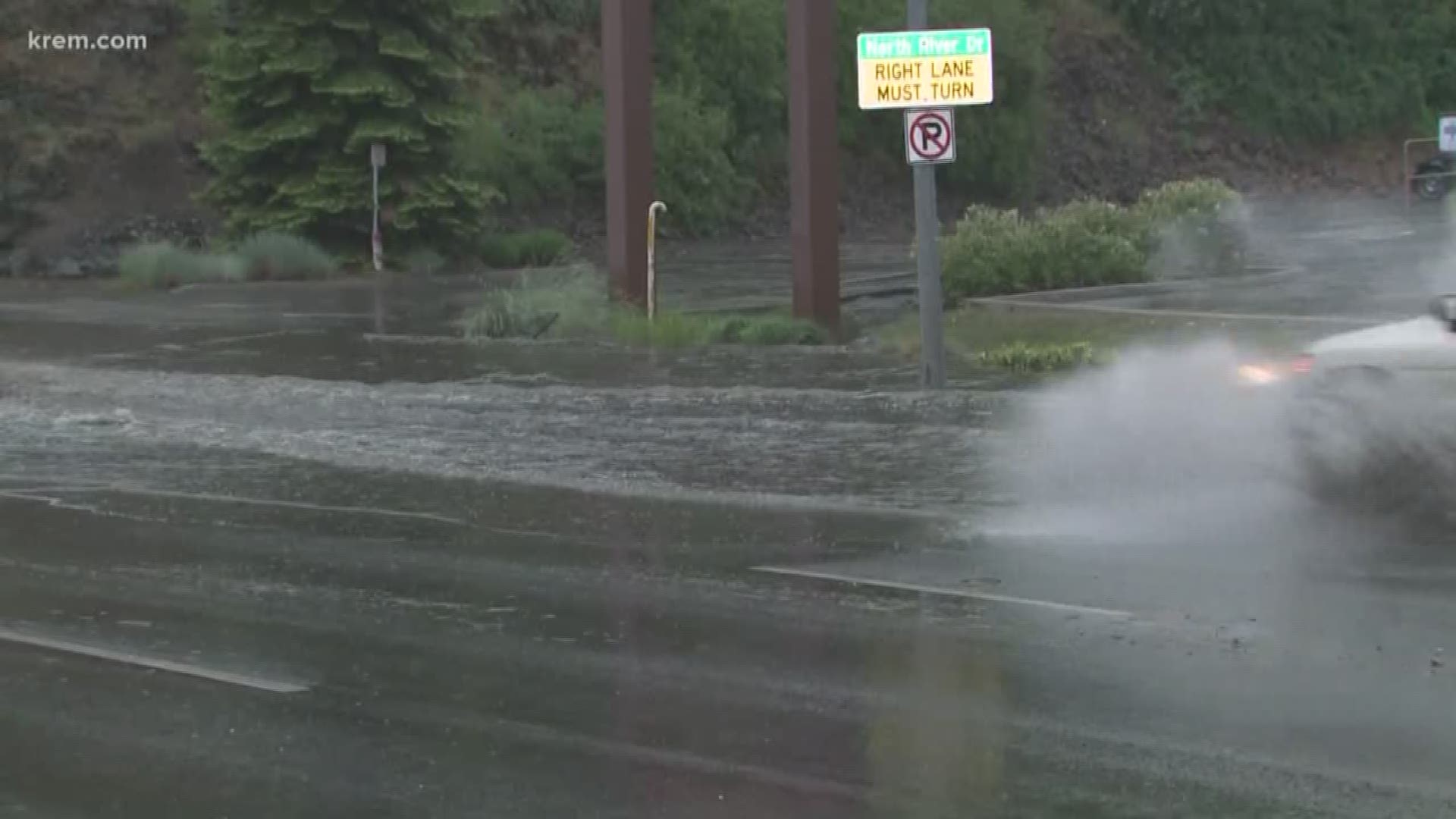 KREM Reporter Amanda Roley went to North Division Street as waters flooded city streets as storms rolled through the area.