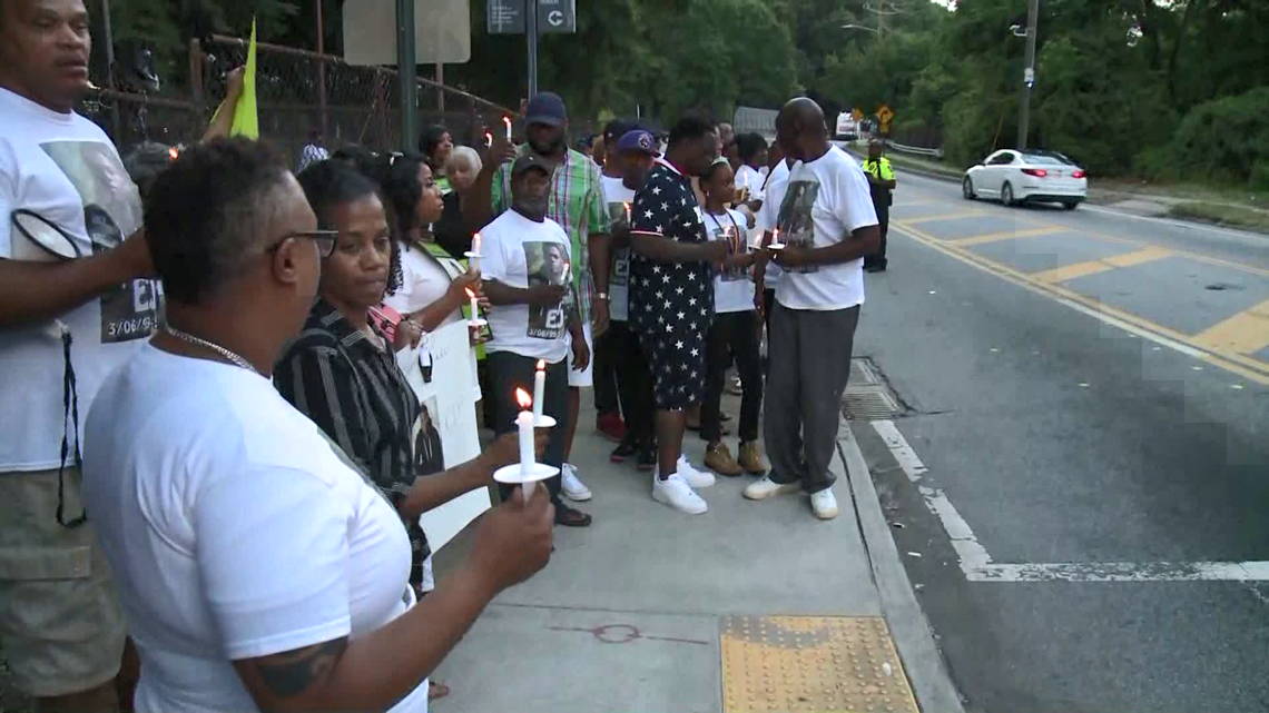 Family demands change to e-scooter rules during vigil for man killed