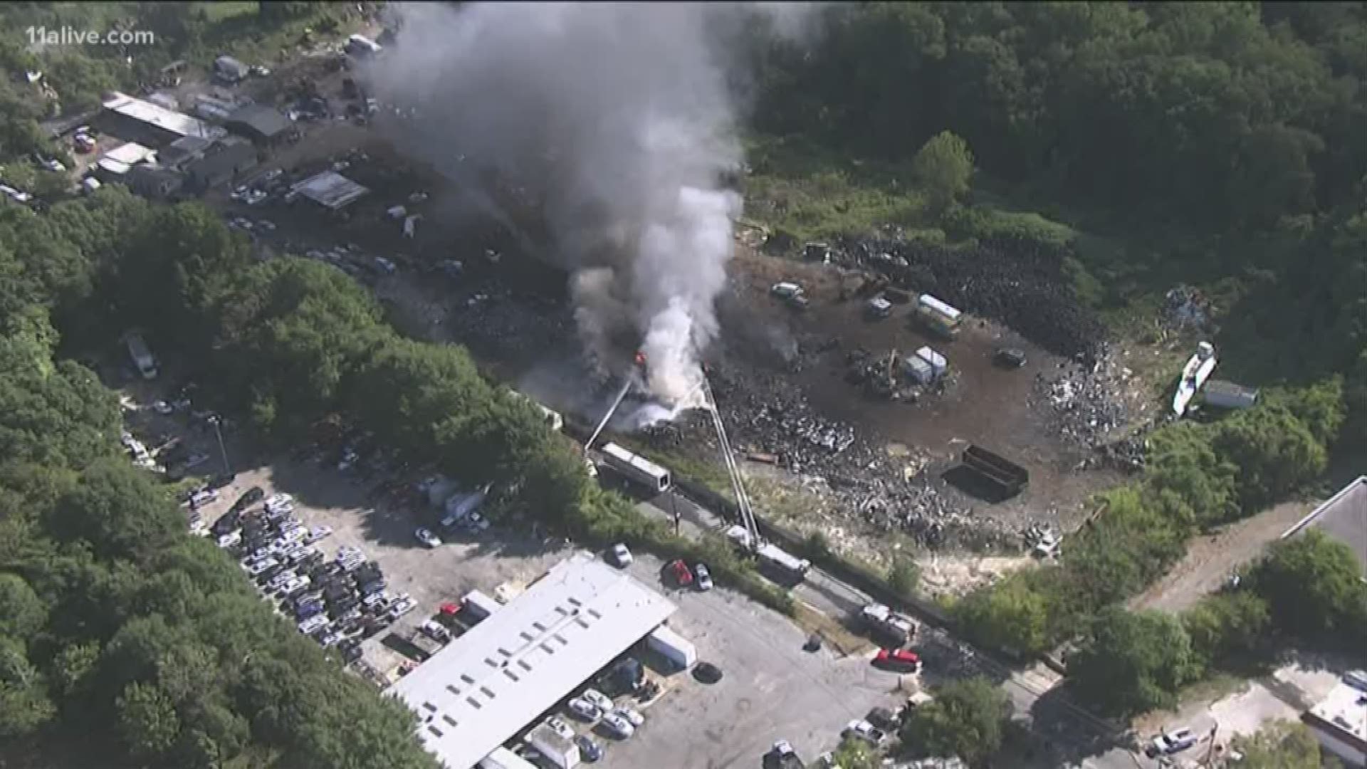 Atlanta fire officials confirmed the fire was happening at Regina Dr. NW in west Atlanta, off Donald Lee Hollowell Parkway. A recycling yard is located on the street